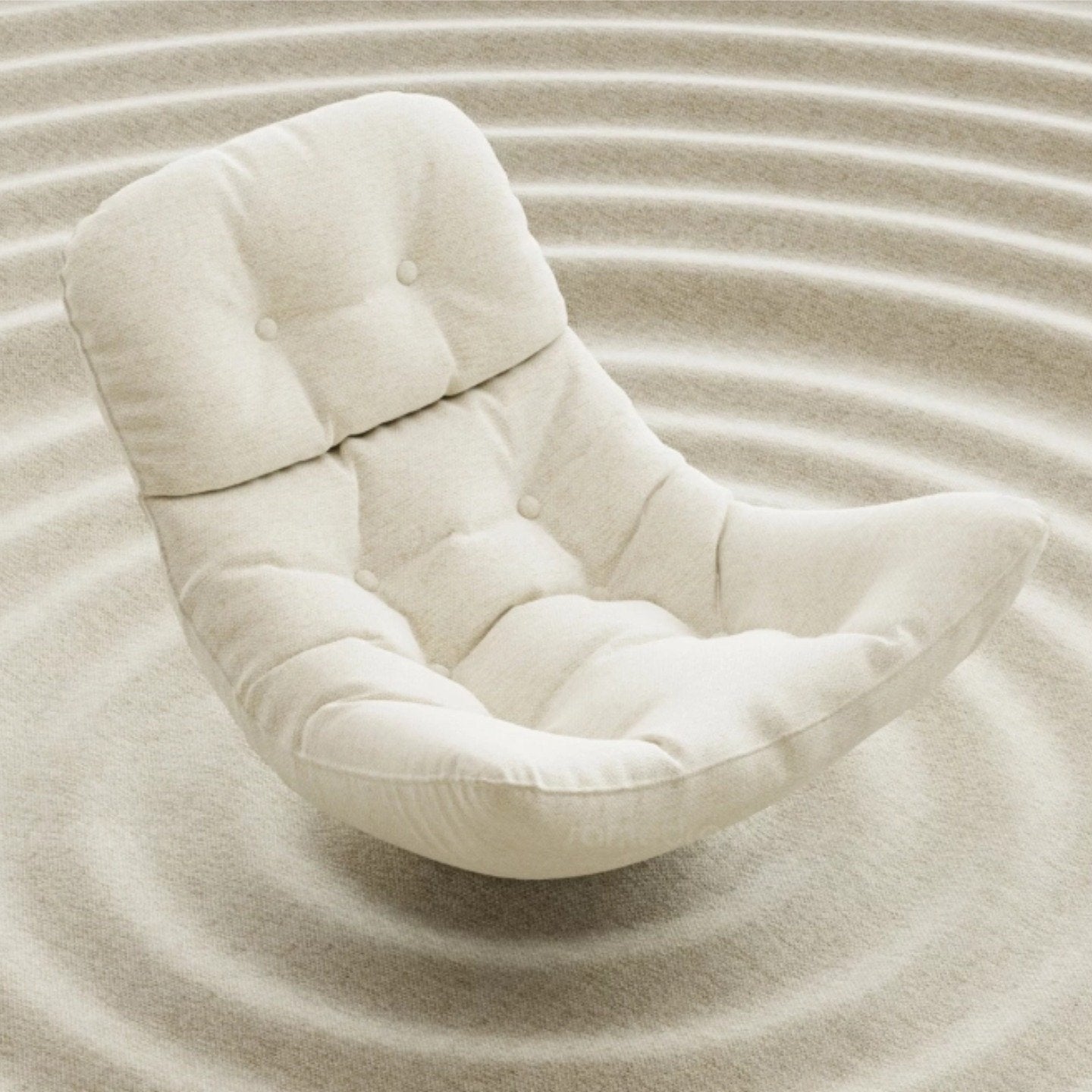 Close-up of the Edie rocking chair's soft beige chenille fabric showing the plush texture and quilted detailing