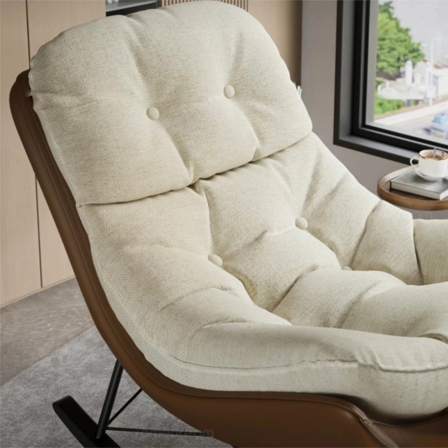 Edie rocking chair in beige chenille styled beside a window in a bright, naturally lit room