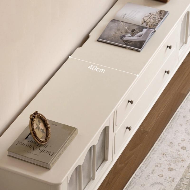 Emily TV console in white with items displayed on top surface in a French-style living room setting