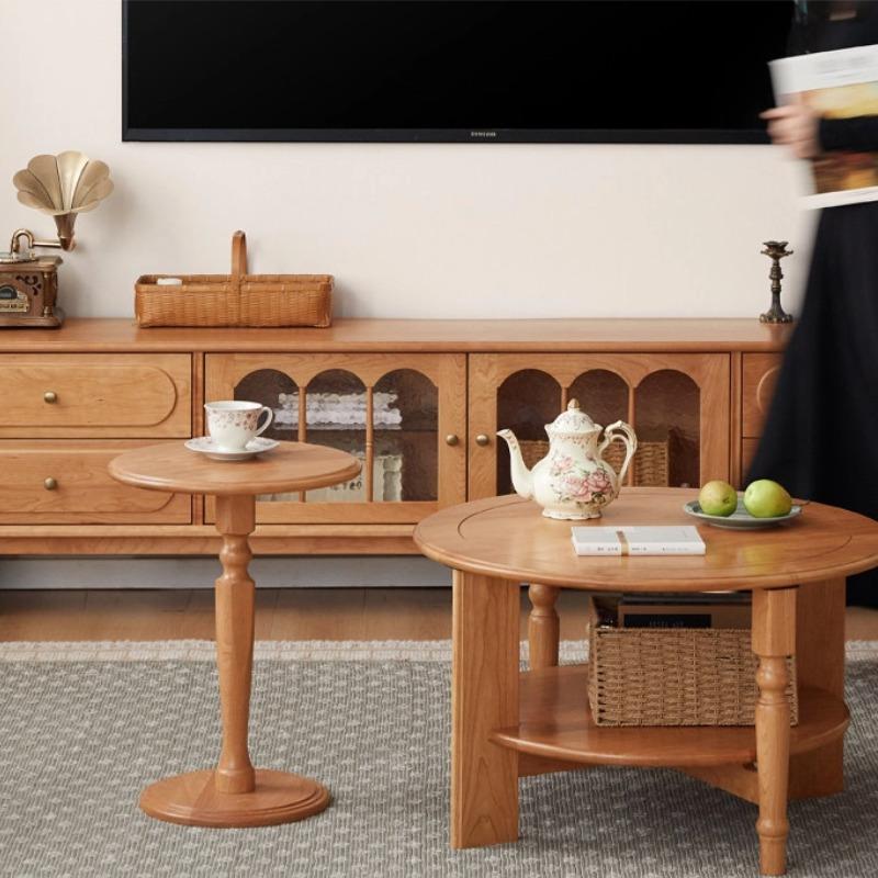 Fayth nesting table set in a living room alongside a TV console and sofa