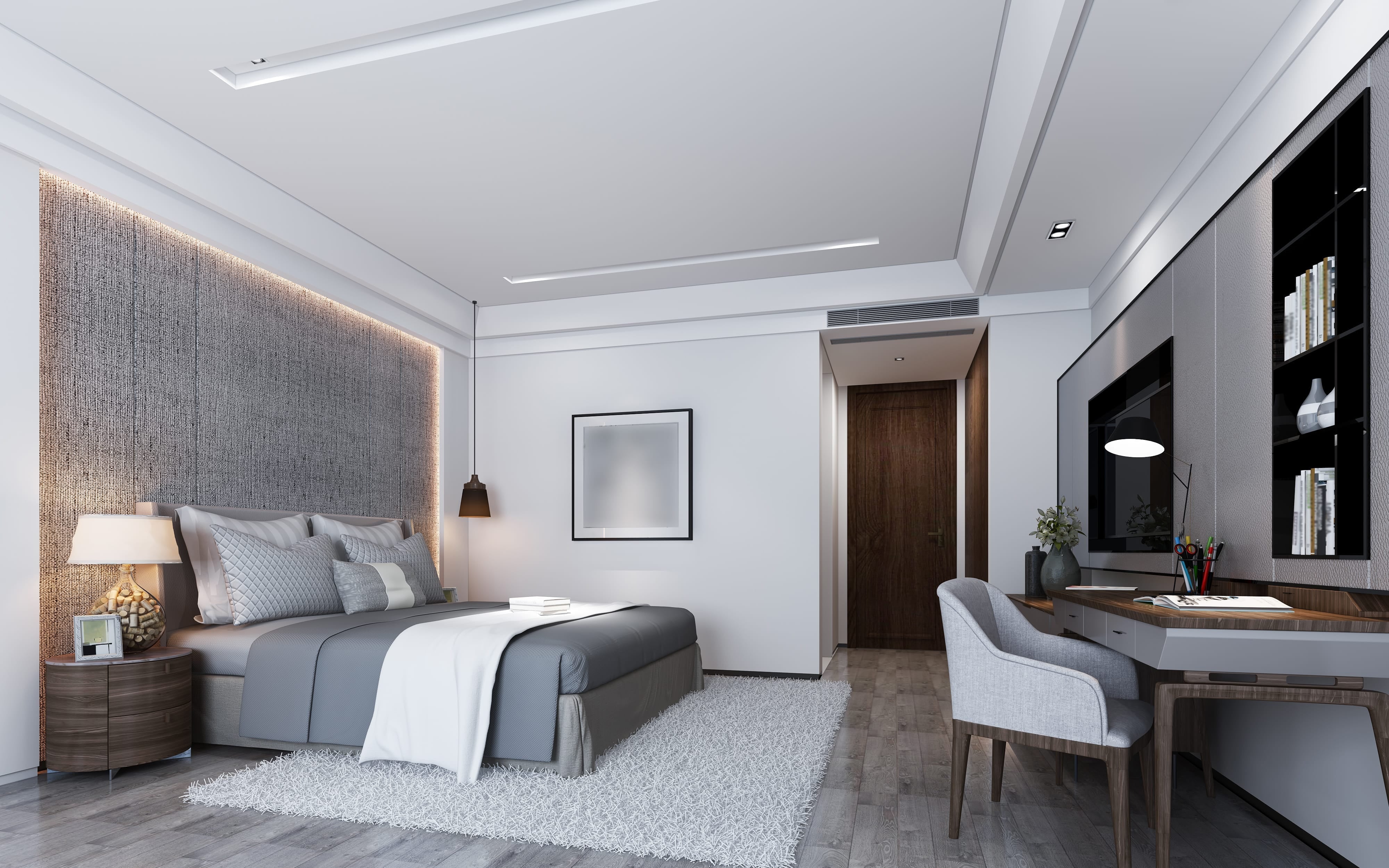 Modern gray storage bed design with an upholstered bed, textured wall, and built-in vanity desk.